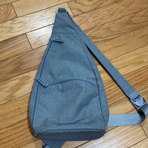 Vera Bradley sling backpack in denim blue